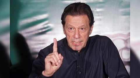 Pakistan's former Prime Minister Imran Khan, gestures as he speaks to the members of the media at his residence in Lahore, Pakistan