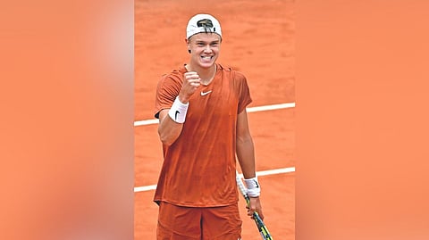 Holger Rune celebrates beating Casper Ruud.