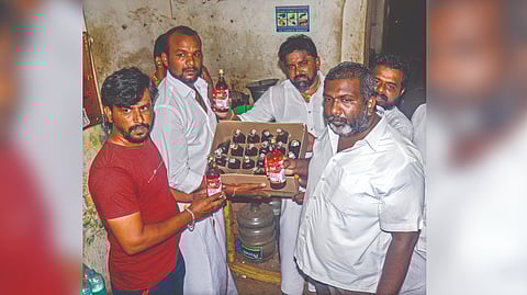 The bar had a stock of liquor
bottles to sell illegally before
the permitted hours. It looks
like both shared liquor from
the same bottle