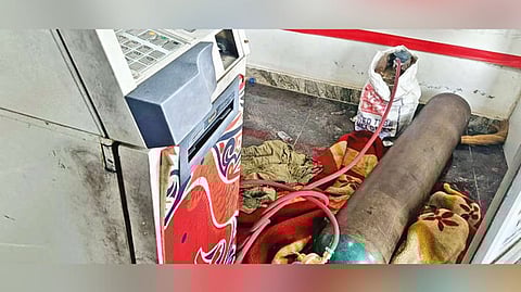 Welding machine and load carrier found in ATM kiosk; (below) the three-member burglary gang