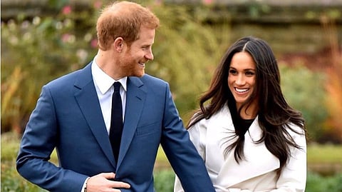 Prince Harry and his wife Meghan