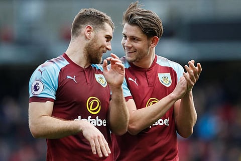 Burnley's Sam Vokes celebrates with James Tarkowski after the match