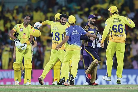 CSK players celebrate after their home win against KKR