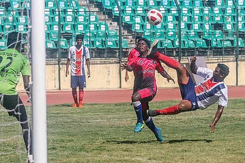 Action during the game between Indian Bank and Customs