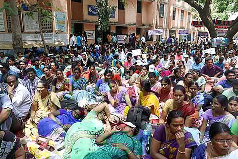 Government teachers and their families during the fourth day of their protest in Chennai on Thursday
