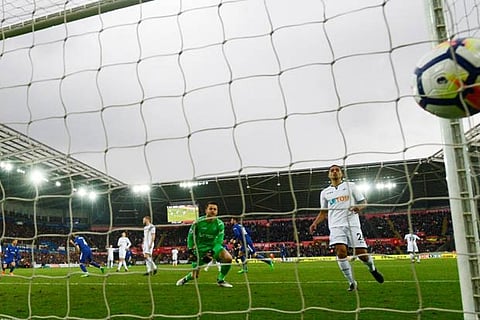 Chelsea's Cesc Fabregas scores their first goal