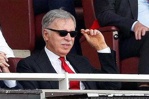 Arsenal owner Stan Kroenke looks on from the stands