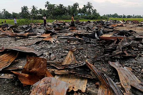 The ruins of a market which was set on fire at a Rohingya village outside Maugndaw in Rakhine state