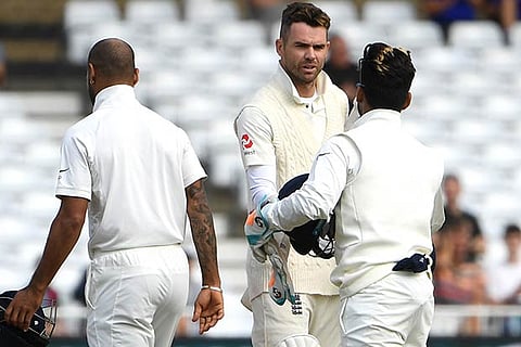 James Anderson shakes hands with Rishabh Pant after England lost to India