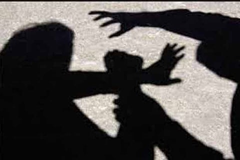 Assistant prof suspended on abuse charge