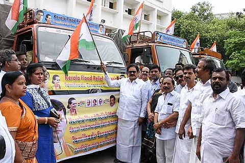 TNCC president S Thirunavukkarasar flags off the lorries carrying relief materials
