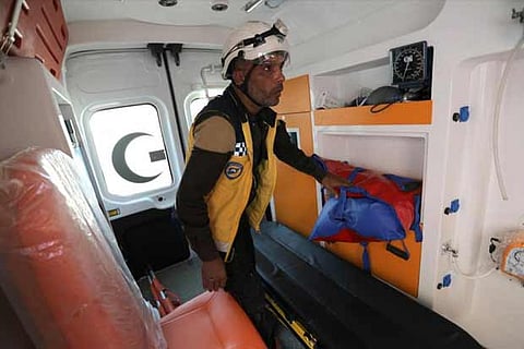Syrian rescue worker Samir Salim is seen in an ambulance