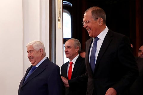 Russian Foreign Minister Sergei Lavrov and Syrian Foreign Minister Walid al-Moualem