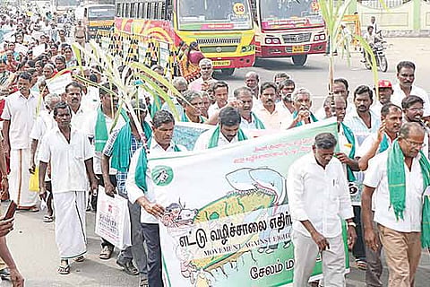 A large number of farmers take out a protest march against the Salem-Chennai corridor on Wednesday