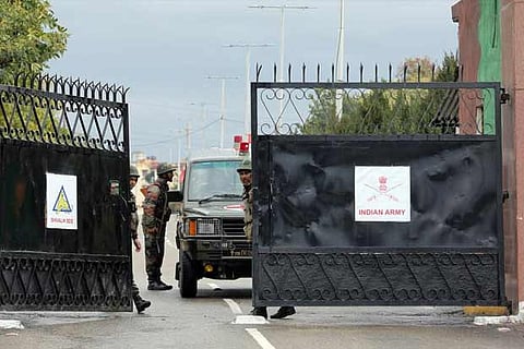 An Indian army ambulance leaves Sunjuwan camp after suspected militants attacked the camp