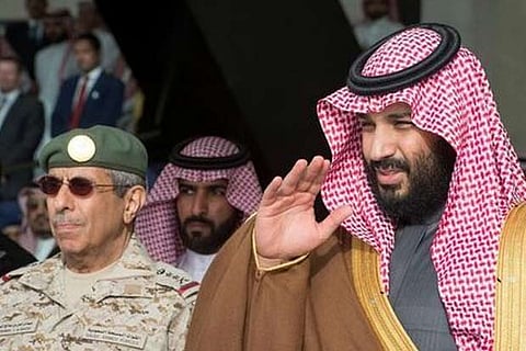 Saudi Arabia's Crown Prince Mohammed bin Salman gestures during the graduation ceremony