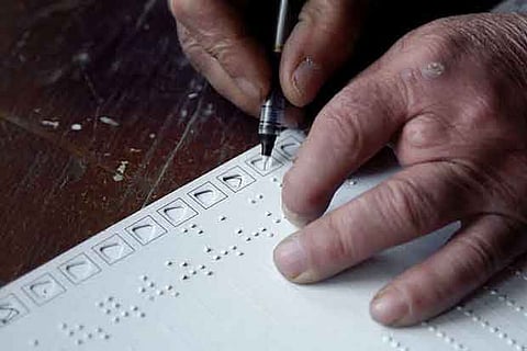 A visually challenged person casts his vote in one of the previous elections (File photo)