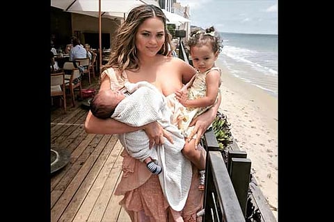 Chrissy Teigen with her kids