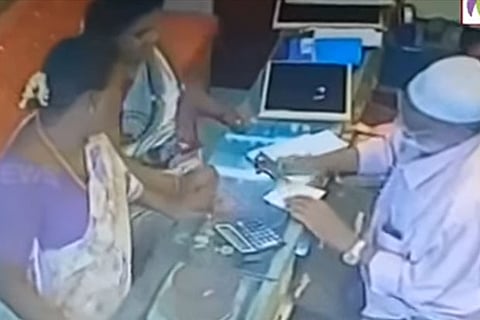 Video grab of the women at the shop