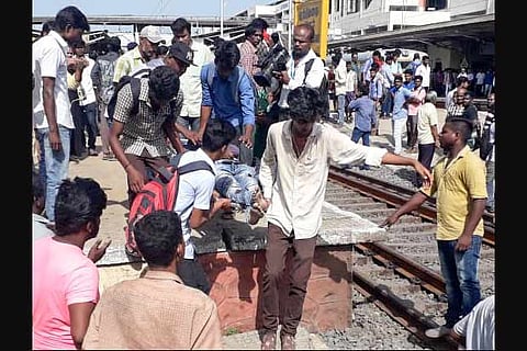 One of the bodies being taken away after the train mishap in Chennai