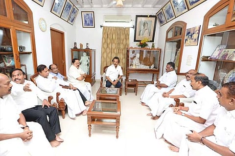 Deputy CM O Panneerselvam calling upon DMK working president MK Stalin