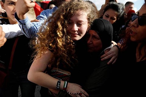 Palestinian teenager Ahed Tamimi is welcomed after she was released from an Israeli prison