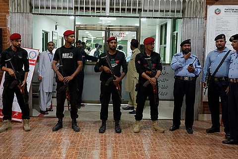 Pakistani police commandos outside the cardiac ward, where jailed former PM Nawaz Sharif was moved