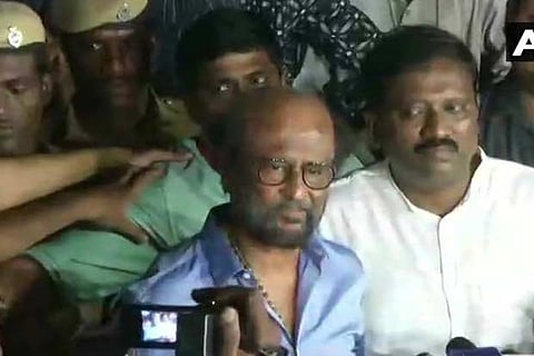 Actor turned politician Rajinikanth speaking to the press outside Kauvery Hospital