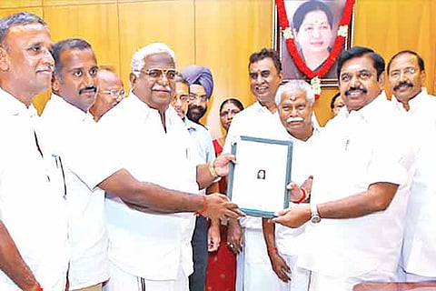 Chief Minister Edappadi K Palaniswami handing over the permit to produce Neera