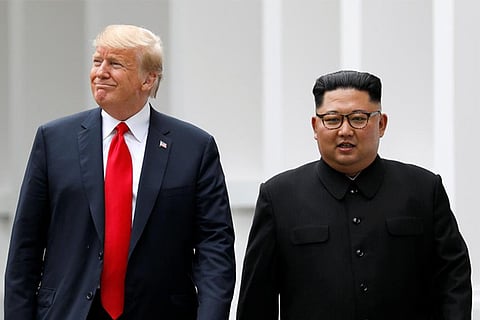 US President Donald Trump and North Korean leader Kim Jong Un taking a walk at the Capella Hotel