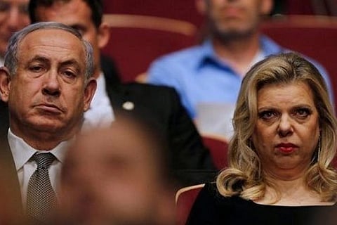 Israeli Prime Minister Benjamin Netanyahu (L) with his wife Sara Netanyahu (R)
