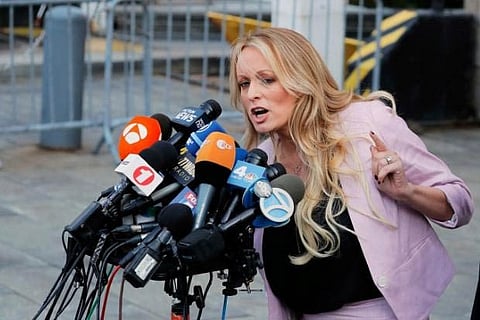 Adult film actress Stephanie Clifford, also known as Stormy Daniels, speaks to media