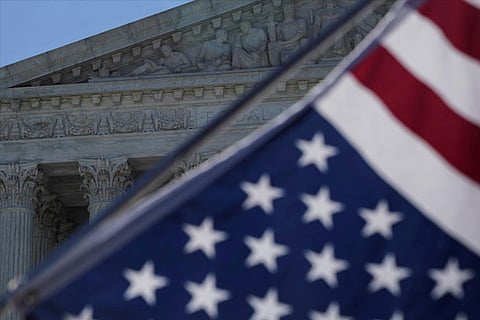 A flag is seen outside the US Supreme Court