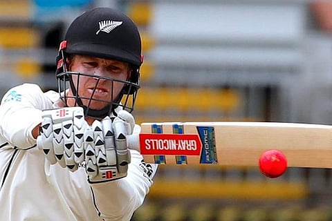 New Zealand's Henry Nicholls plays a shot