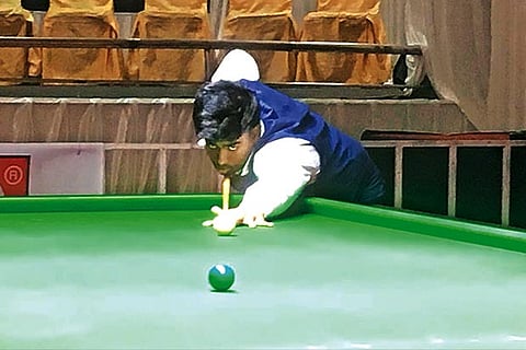 S Shrikrishna on the way to one of his big breaks during the final against J Varun Kumar