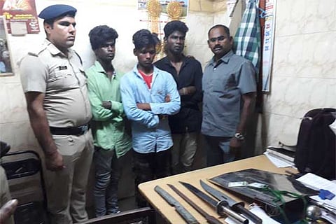 The college students with the weapons seized from them