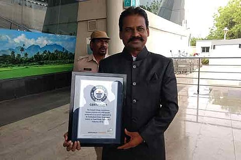 A Venkatesh Babu with the Guinness certificate