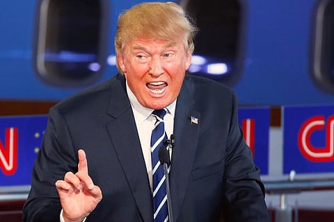 Trump defends 'animals' remark, says will continue to use it