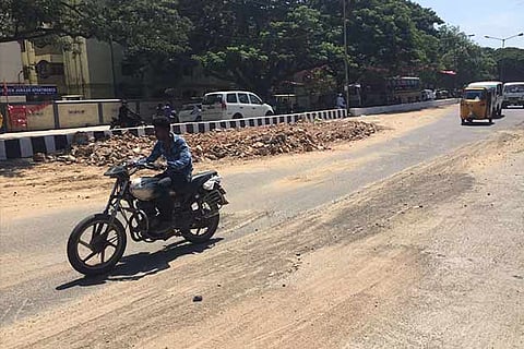The road is dug up at various places and plumes of dust keep rising throughout the day