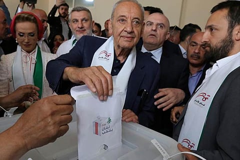 Lebanese Parliament Speaker and candidate for parliamentary election Nabih Berri casts his vote