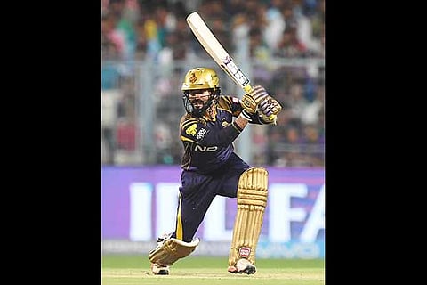 Dinesh Karthik plays a shot during his knock of 52 against Rajasthan Royals