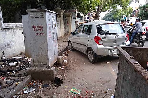 Garbage bin and EB junction box blocking the way for pedestrians