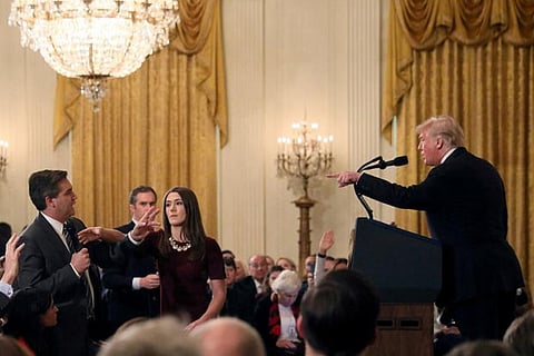 CNN sues President Trump, his White House aides over barring of reporter