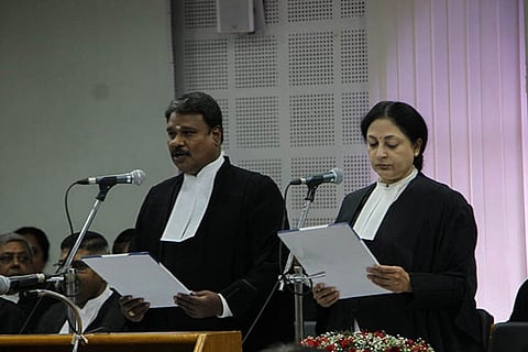 Justice B Pugalendhi being sworn in as  an additional judge by Chief Justice  VK Tahilramani on Tuesday