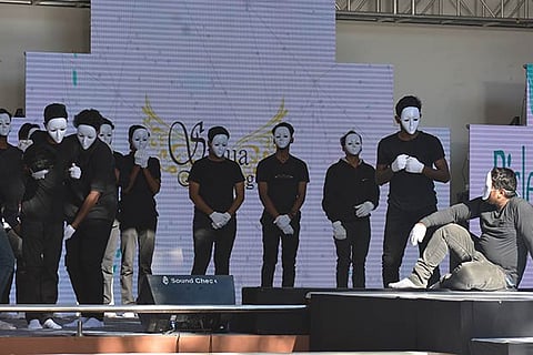 Students perform mime on women empowerment