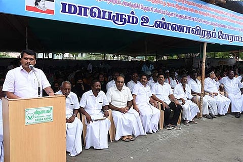 AMMK cadre staging a hunger strike in Karur on Friday