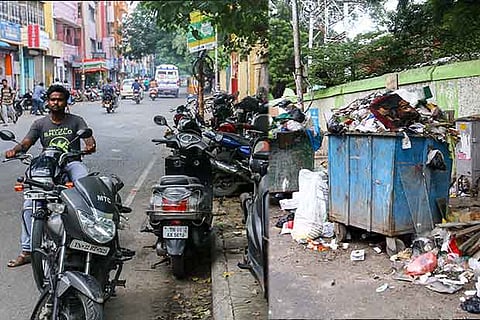 Construction materials, garbage bins and two-wheelers elbow out pedestrians on to the road