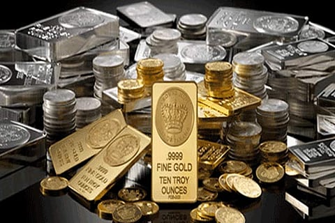 Gold falls Rs 70 on global cues, weak demand