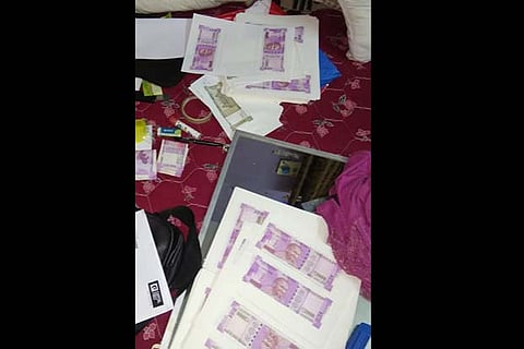 The printer and fake notes seized