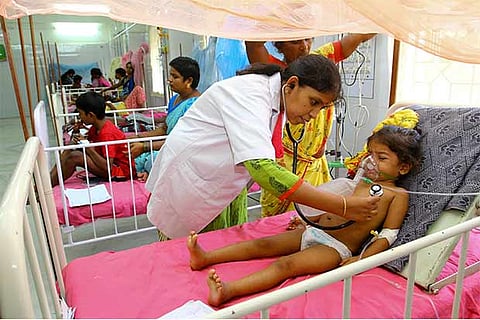 A child admitted with dengue symptoms undergoing treatment at the Dengue Ward 